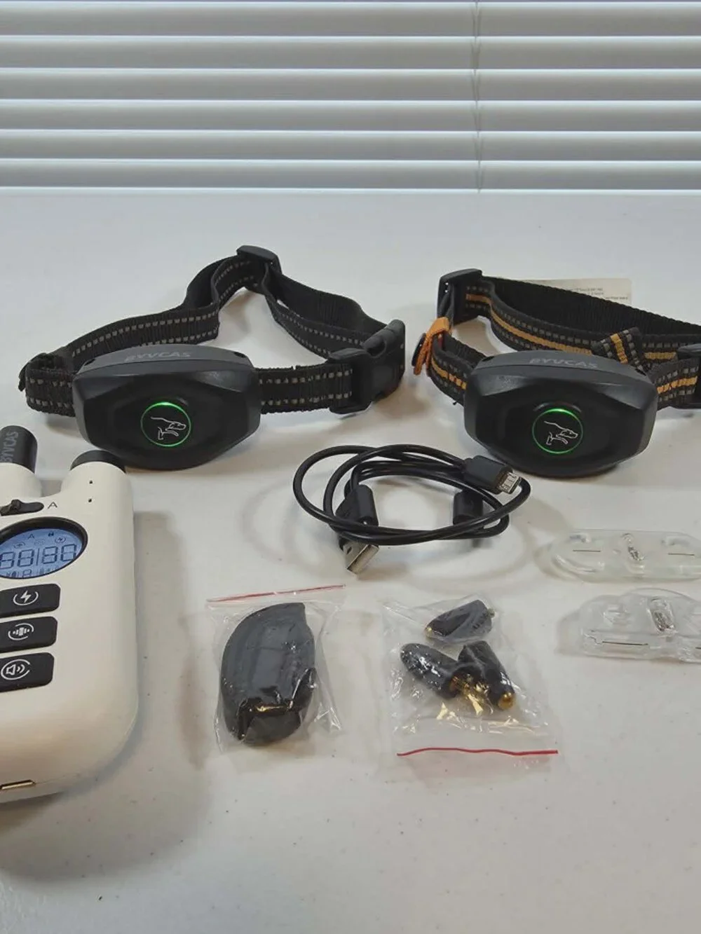 DOG TRAINING BARK COLLARS WITH REMOTE BYVCAS DUAL ACTION USED ONCE